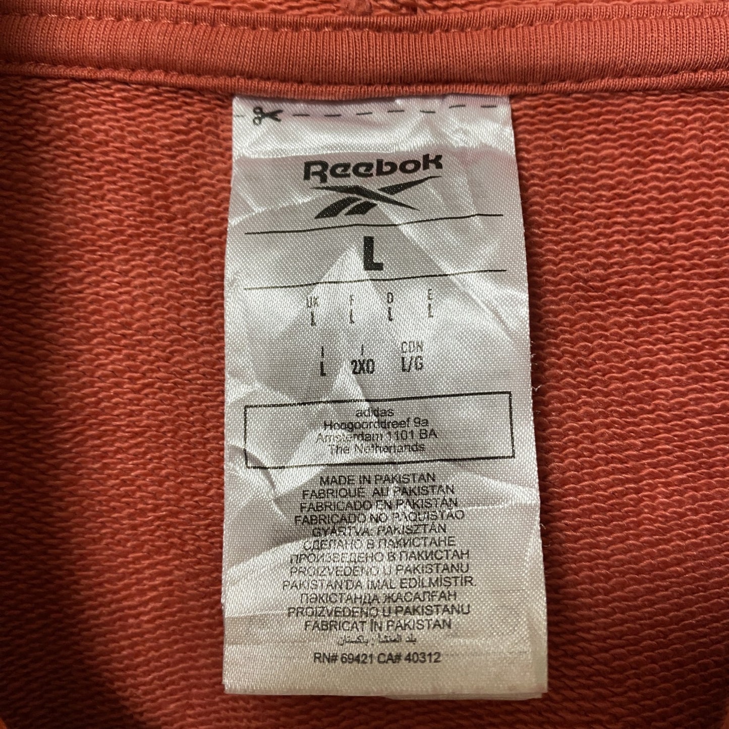 古着 used Reebok リーボック 長袖ワンポイントロゴプルオーバーパーカー フーディー バックプリント オレンジ Lサイズ