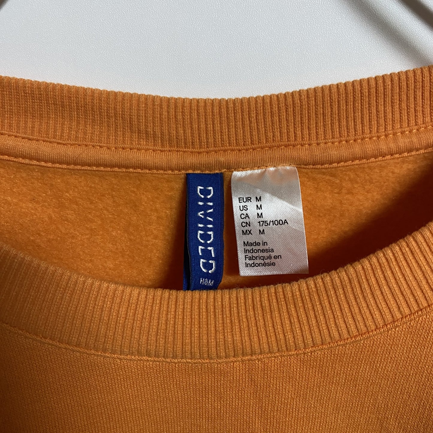 古着 used H&M 長袖バックプリントスウェット トレーナー クルーネック オレンジ レトロ デザイン 秋冬服 Mサイズ
