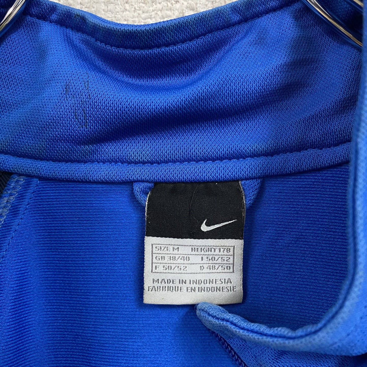 NIKE ナイキ トラックジャケット/ジャージ ハイネック スウッシュ ラグランスリーブ 青 ブルー Mサイズ