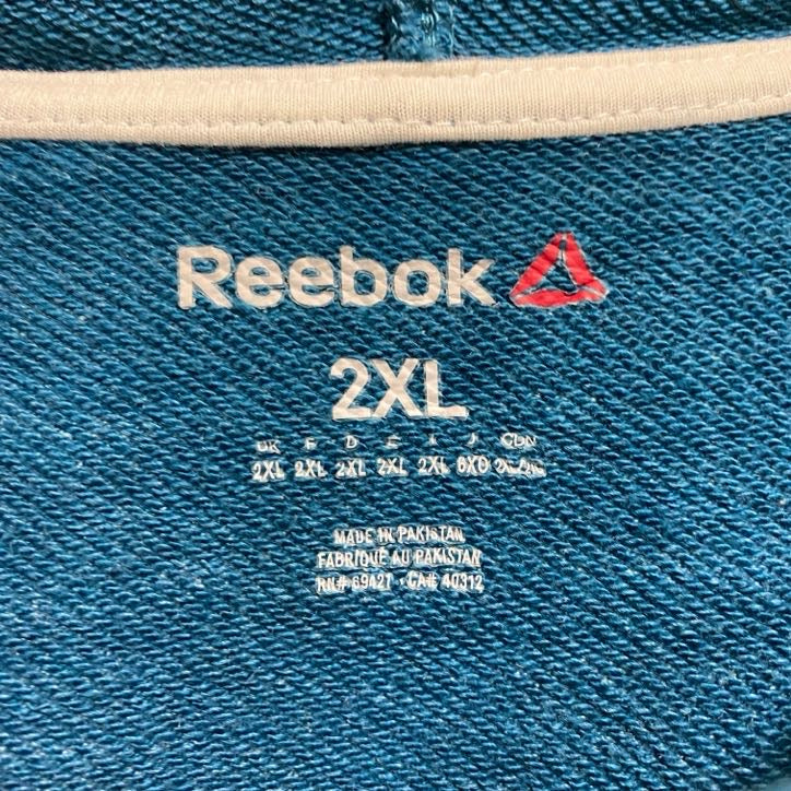 古着 used Reebok リーボック 長袖ワンポイント刺繍ジップアップパーカー 水色 秋冬服 ビッグシルエット 2XLサイズ