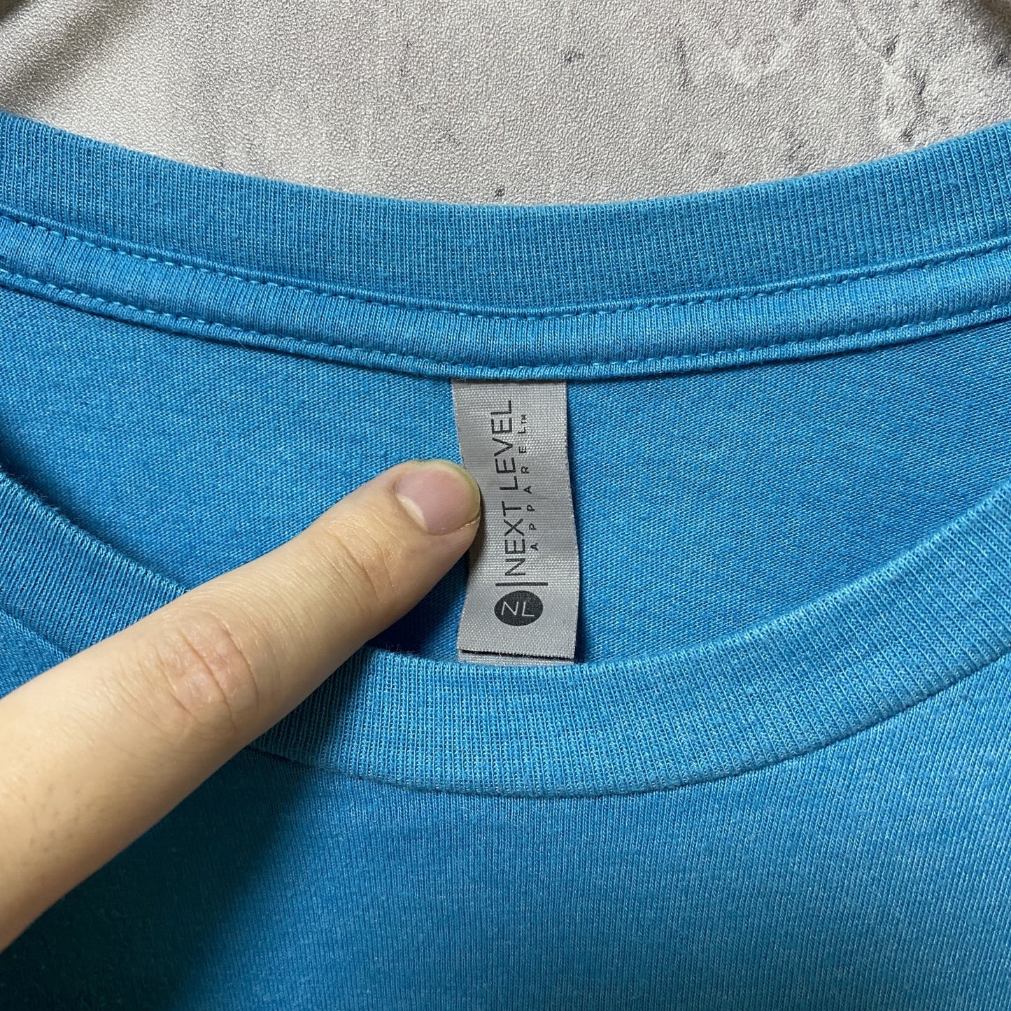 古着 used NEXT LEVEL APPAREL 半袖クルーネックプリントTシャツ 水色 ブルー レトロデザイン Lサイズ
