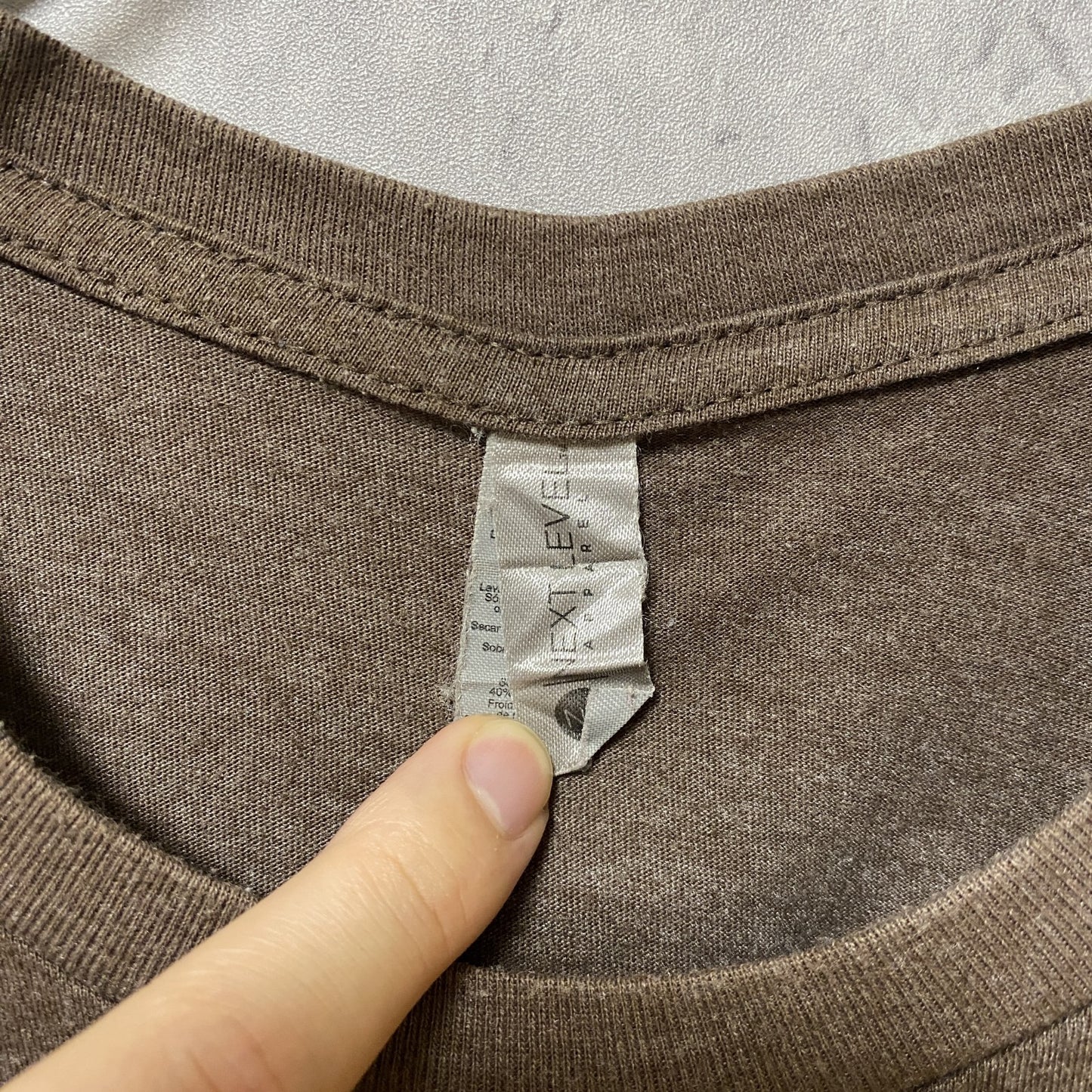 古着 used NEXT LEVEL 半袖クルーネックプリントTシャツ 茶 ブラウン レトロデザイン Lサイズ