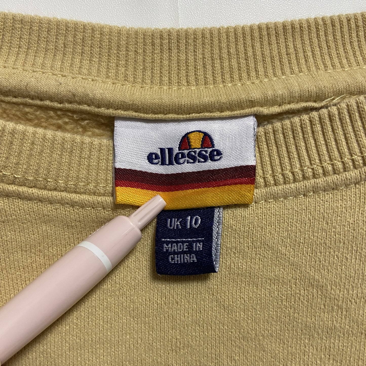 古着 used ellesse エレッセ 長袖クルーネックワンポイントロゴプリントスウェット トレーナー ベージュ EU38サイズ