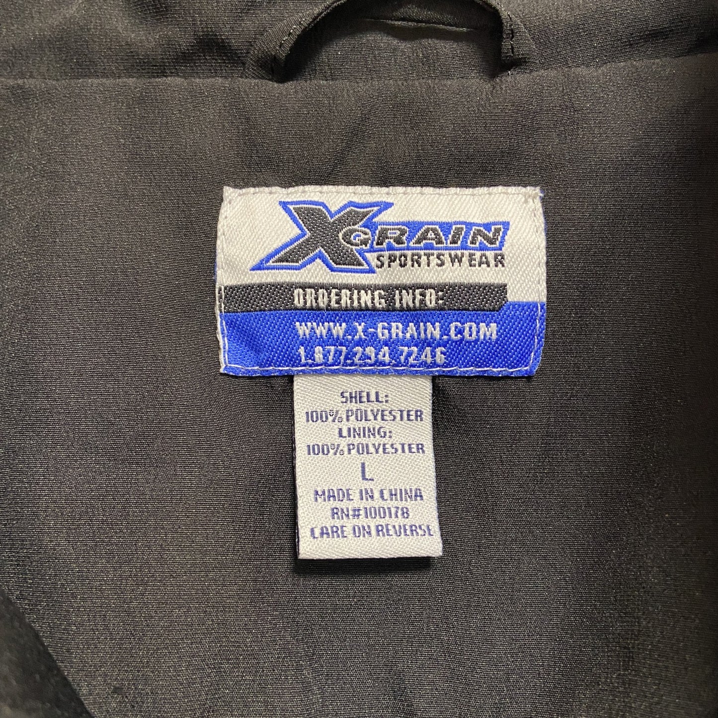 古着 used XGRAIN 長袖ハーフジップナイロンプルオーバー ワッペン LEOPARD SOCCER 黒 オレンジ Lサイズ