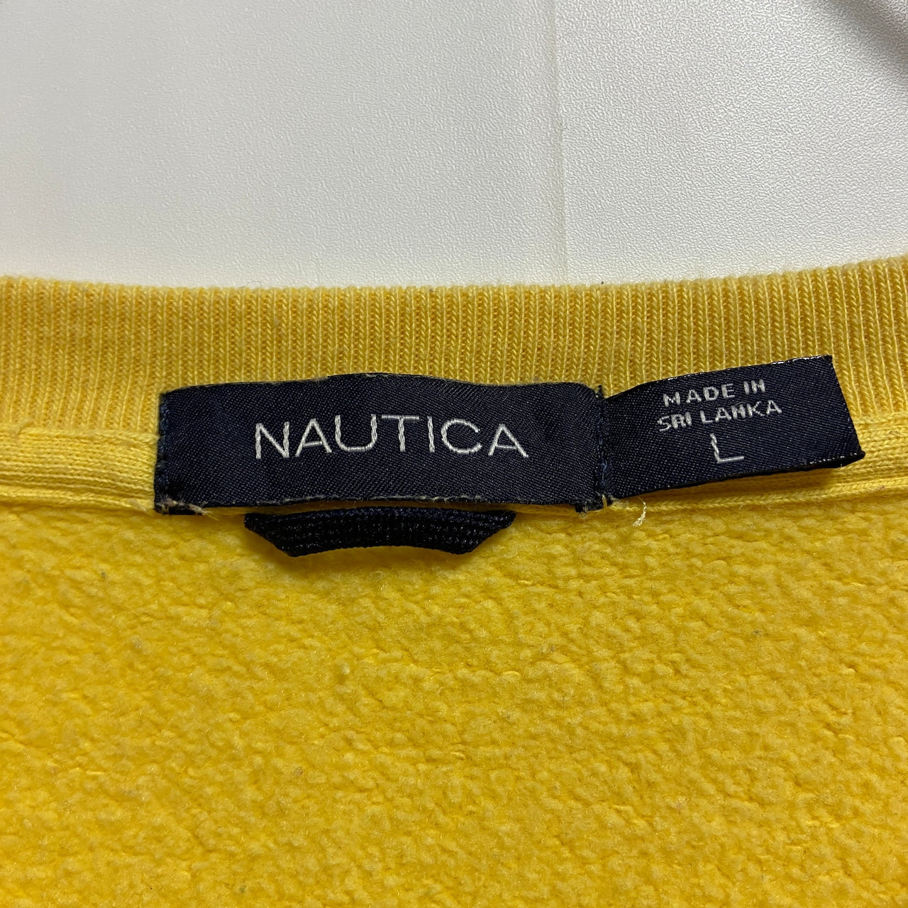 古着 used NAUTICA ノーティカ 長袖ワンポイント刺繍スウェット トレーナー クルーネック 黄色 秋冬服 Lサイズ