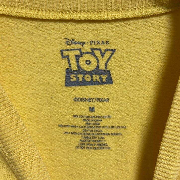 古着 used Disney TOYSTORY トイストーリー 長袖公式キャラクタープリントスウェット トレーナー 黄色 Mサイズ