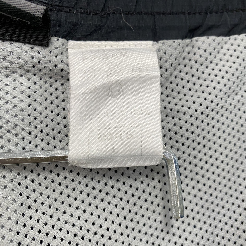 00s　NIKE　ナイキ　トラックパンツ　ナイロンパンツ　スウッシュ　ヴィンテージ　黒　ブラック　Lサイズ