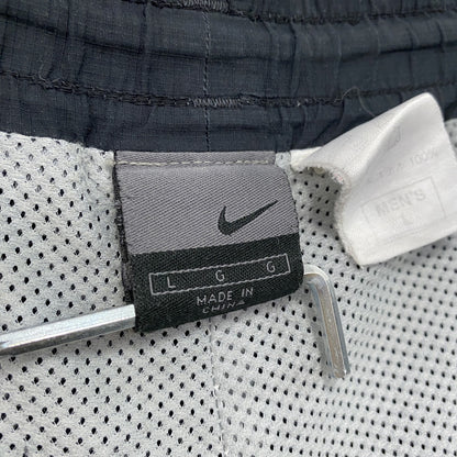 00s　NIKE　ナイキ　トラックパンツ　ナイロンパンツ　スウッシュ　ヴィンテージ　黒　ブラック　Lサイズ