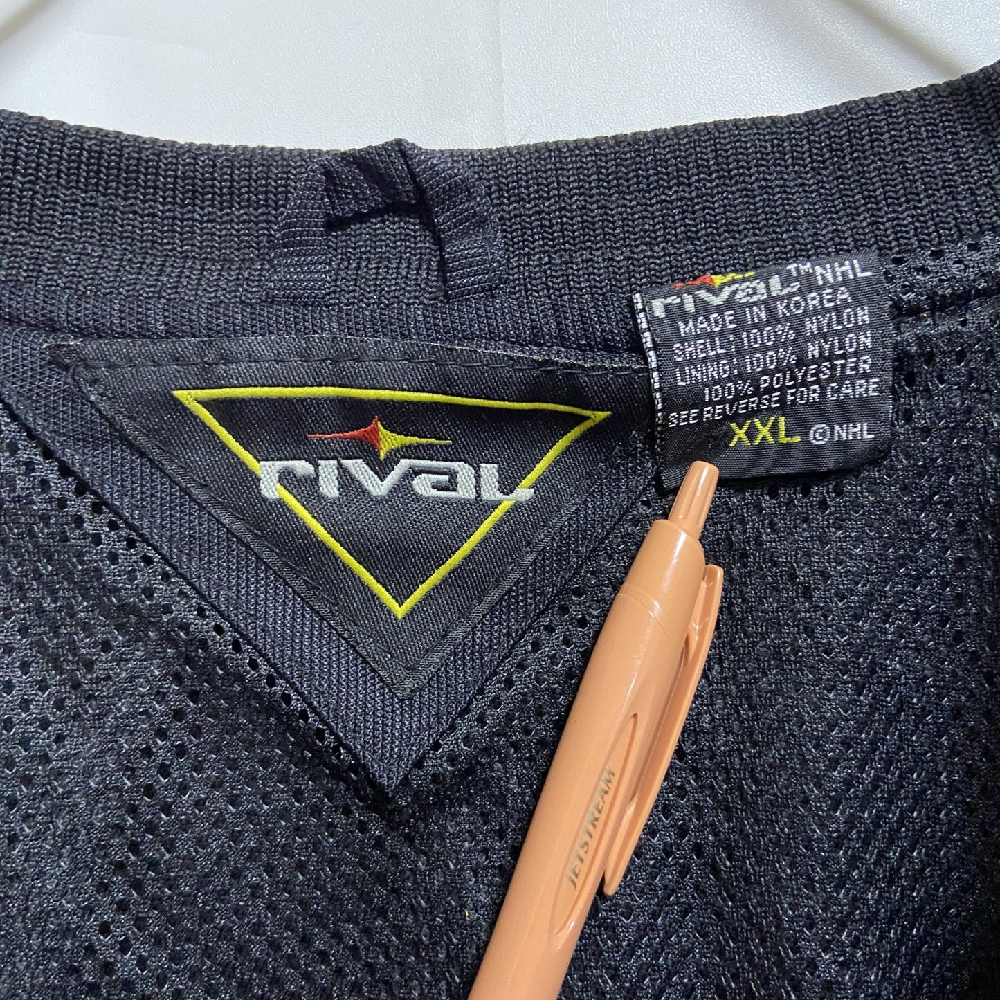 古着 used　rivaL　長袖ハーフジップナイロンジャケット　ワンポイント刺繍　黒　オレンジ　ビッグシルエット　2XLサイズ