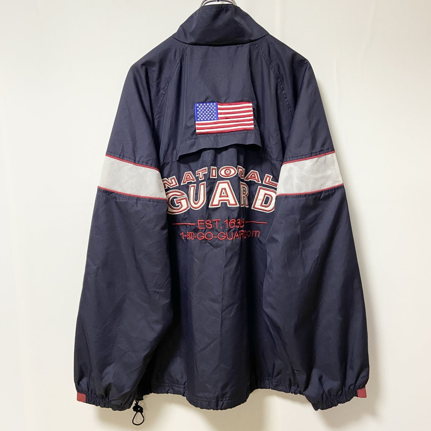 古着 used　NATIONAL GUARD　長袖ハイネックナイロンジャケット　ワンポイント刺繍　アメリカ　ネイビー　Lサイズ