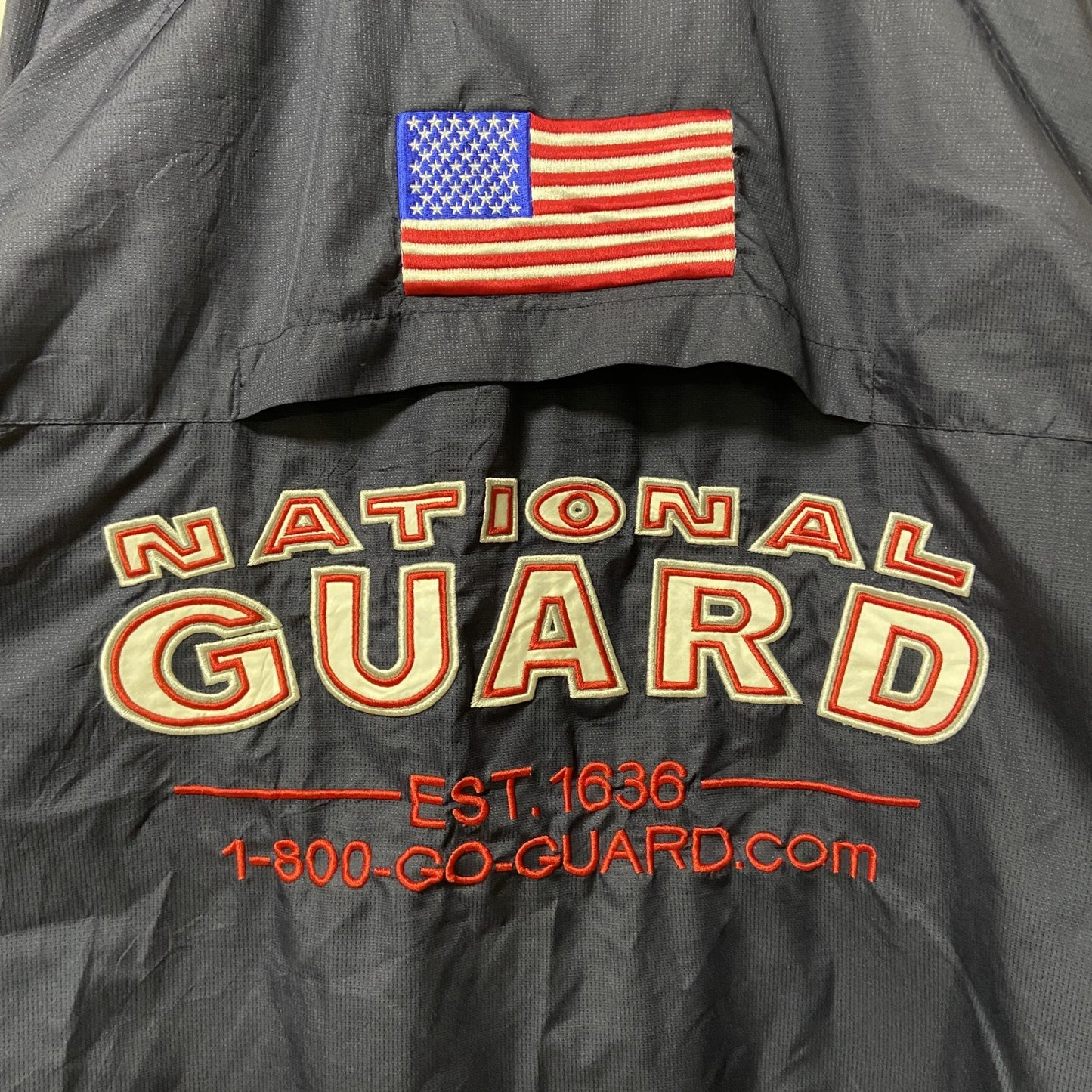 古着 used　NATIONAL GUARD　長袖ハイネックナイロンジャケット　ワンポイント刺繍　アメリカ　ネイビー　Lサイズ