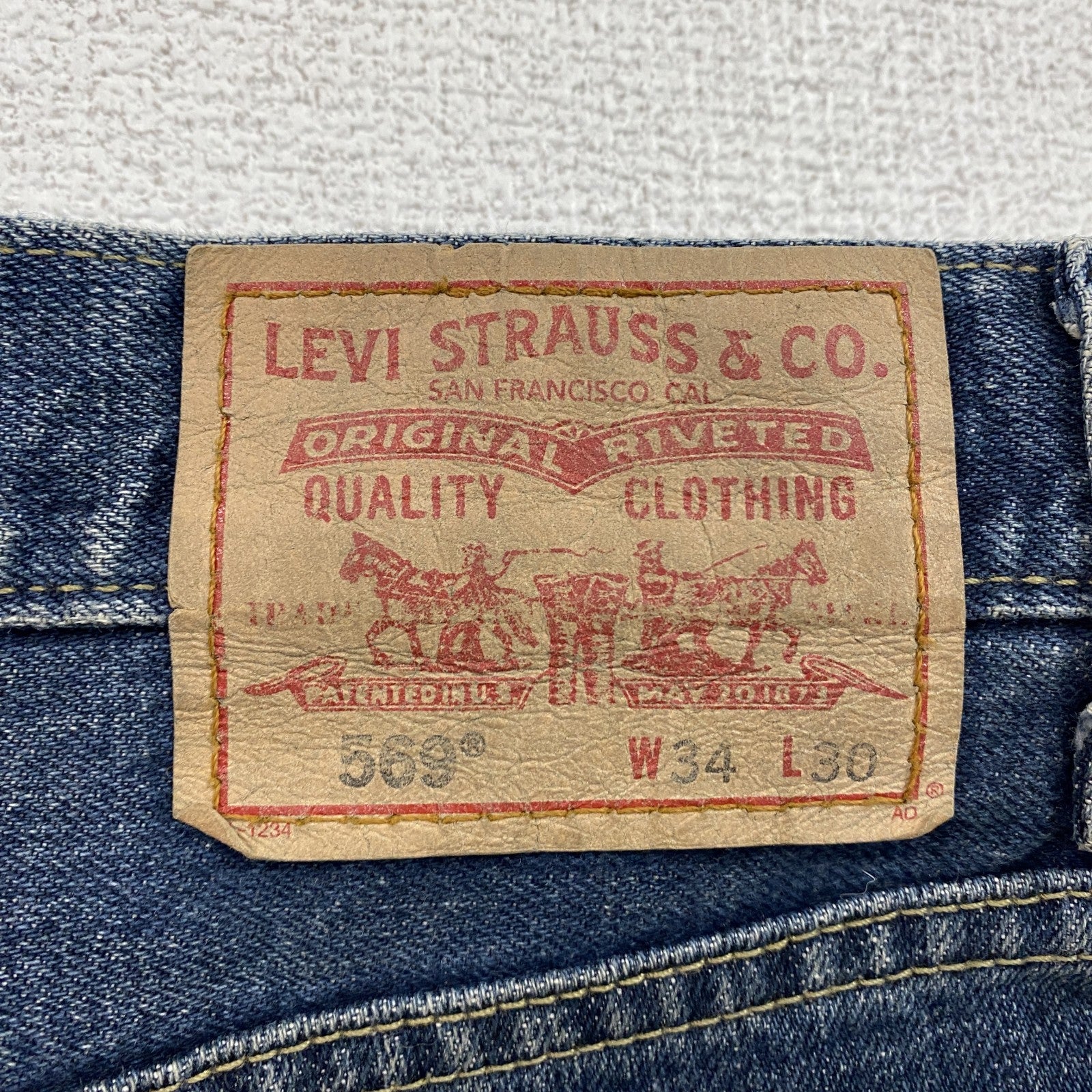 LEVI’S　リーバイス　569　ルーズストレートデニムパンツ　カットオフ　インディゴ　W34サイズ