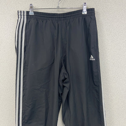 adidas　アディダス　CLIMASTORM　トラックパンツ/ジャージ　パーフォーマンスロゴ　黒　ブラック　Oサイズ
