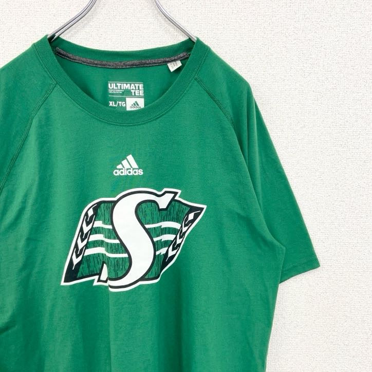 古着 used　adidas　アディダス　半袖フットボールプリントTシャツ　サスカチュワン ラフライダーズ　カナダ　緑　XLサイズ