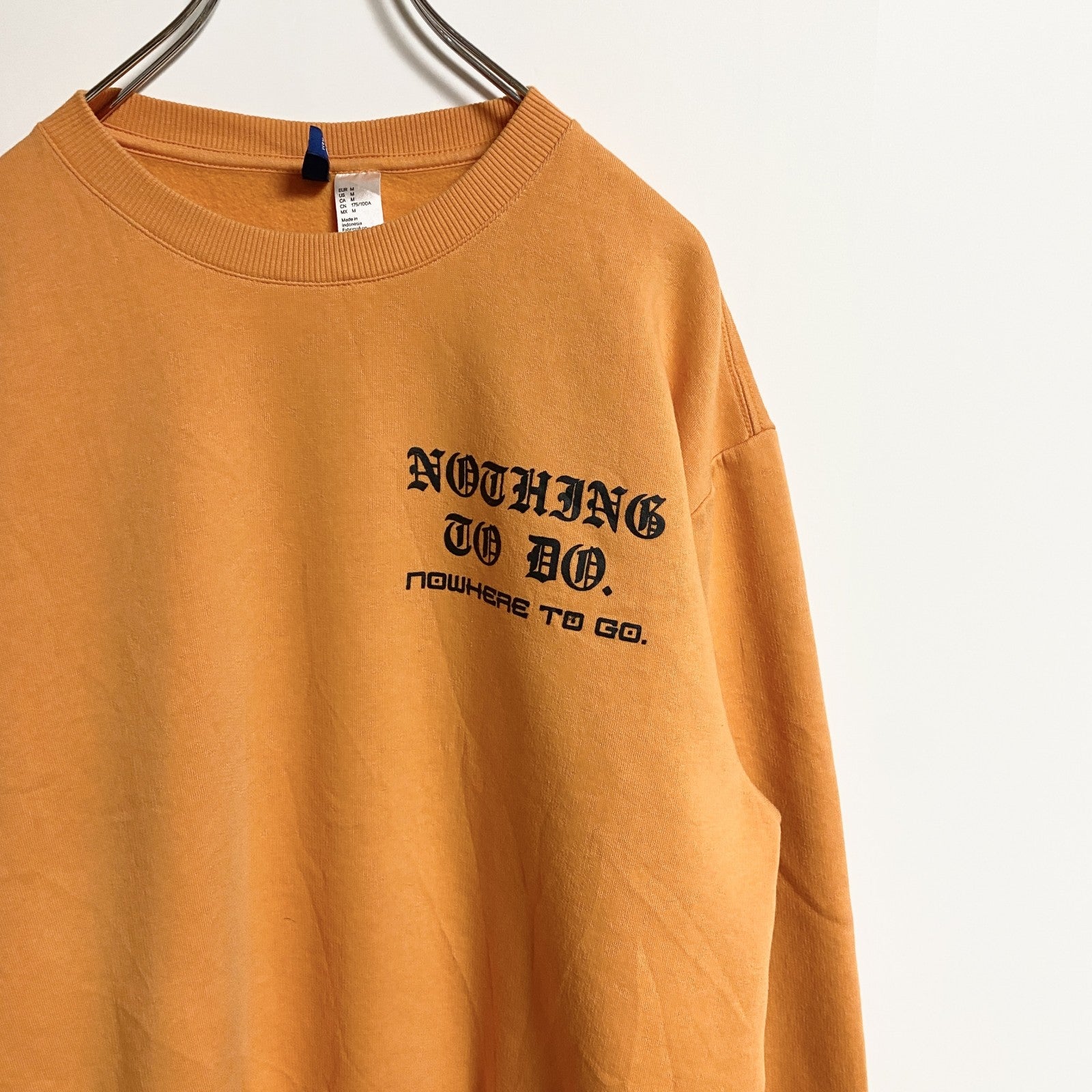 古着 used　H＆M　長袖バックプリントスウェット　トレーナー　クルーネック　オレンジ　レトロ　デザイン　秋冬服　Mサイズ