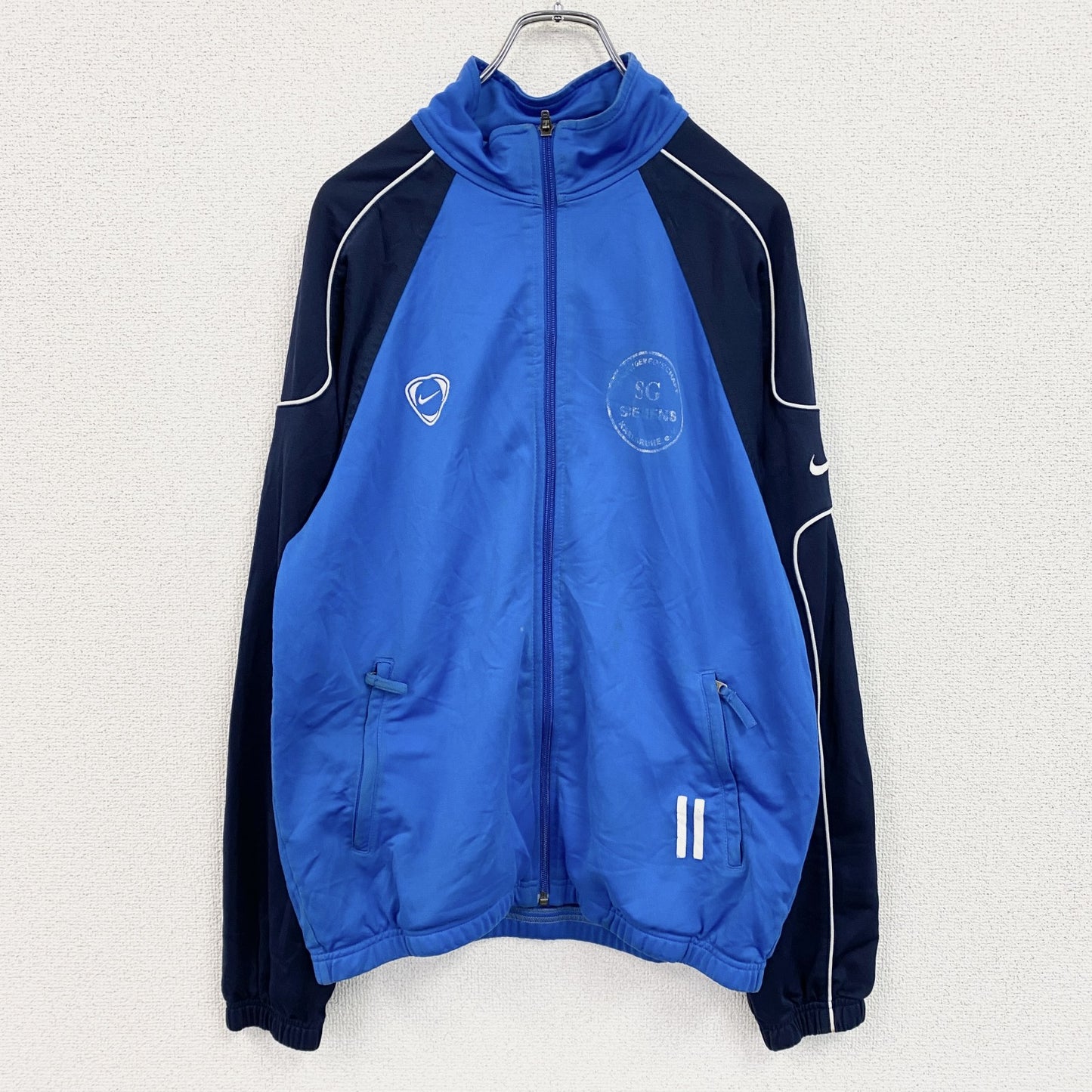 NIKE　ナイキ　トラックジャケット/ジャージ　ハイネック　スウッシュ　ラグランスリーブ　青　ブルー　Mサイズ