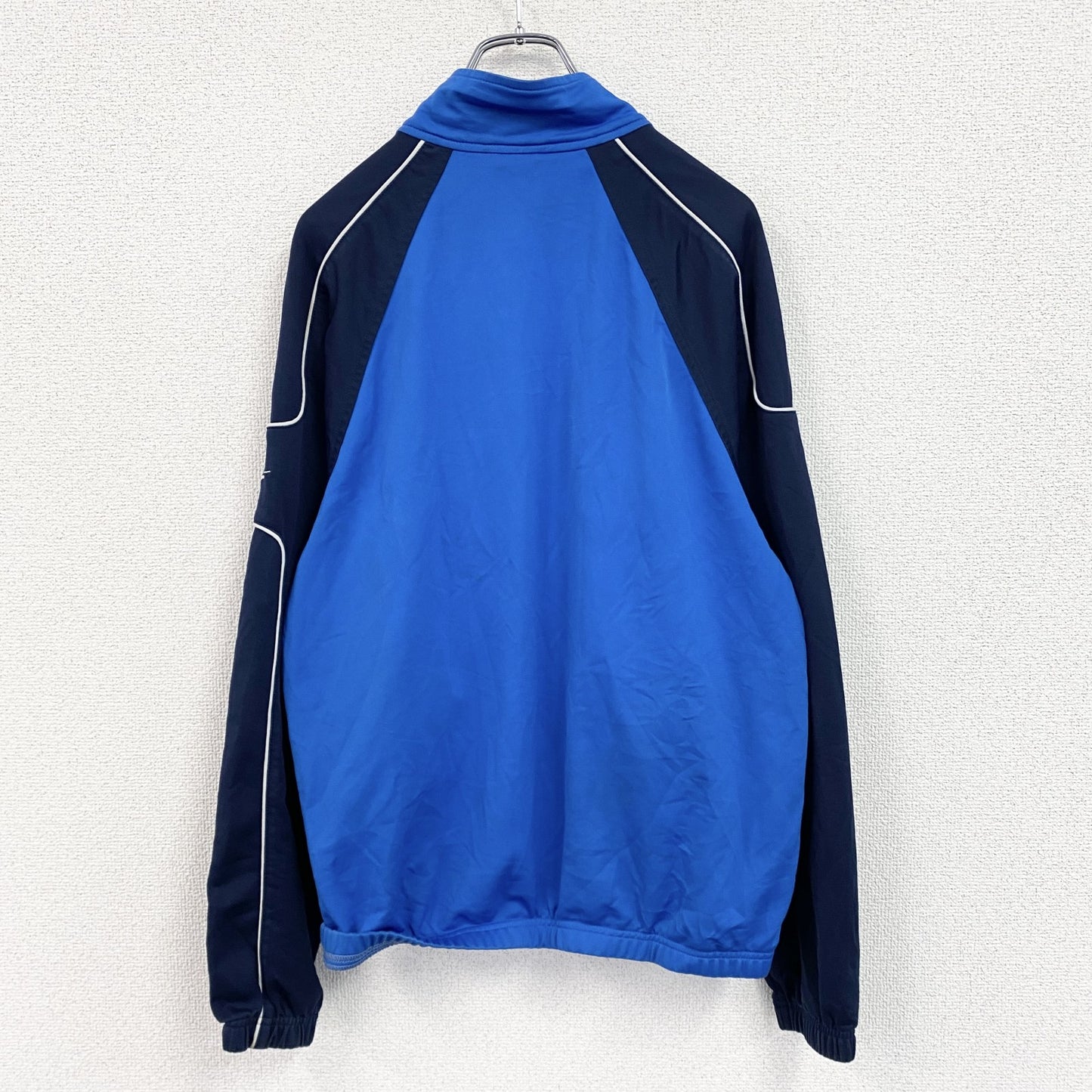 NIKE　ナイキ　トラックジャケット/ジャージ　ハイネック　スウッシュ　ラグランスリーブ　青　ブルー　Mサイズ