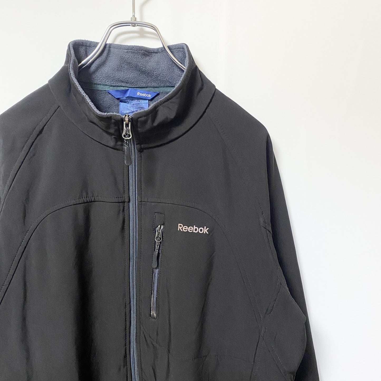 古着 used　Reebok リーボック　長袖裏フリースジャケット　ナイロンジャケット　ワンポイントプリントアウター　黒　ブラック