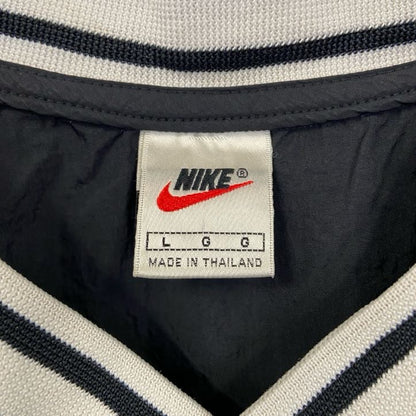 古着 used　90s　NIKE ナイキ　長袖ナイロンプルオーバー　ワンポイント刺繍　リブライン　ヴィンテージ　黒　Lサイズ