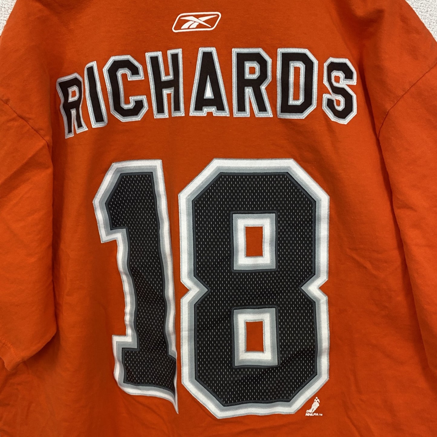 古着　used　Reebok　リーボック　半袖プリントTシャツ　NHL　フィラデルフィア・フライヤーズ　オレンジ　XLサイズ