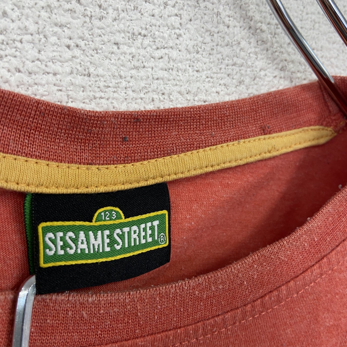 SESAMI STREET　セサミストリート　半袖プリントTシャツ　クッキーモンスター　オレンジ