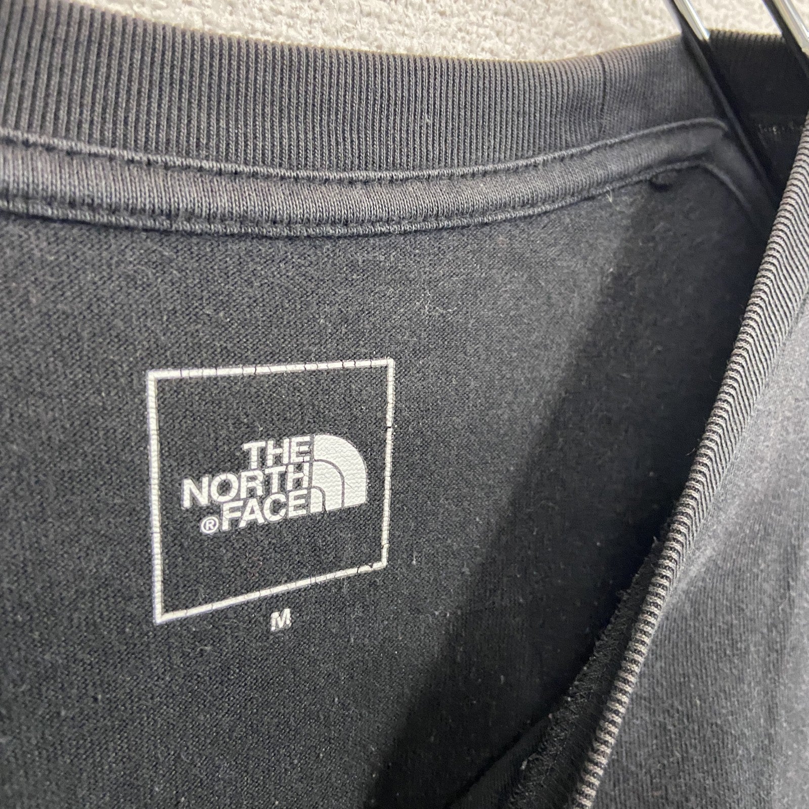 THE NORTH FACE　ザ・ノースフェイス　半袖プリントＴシャツ　黒　ブラック　Mサイズ