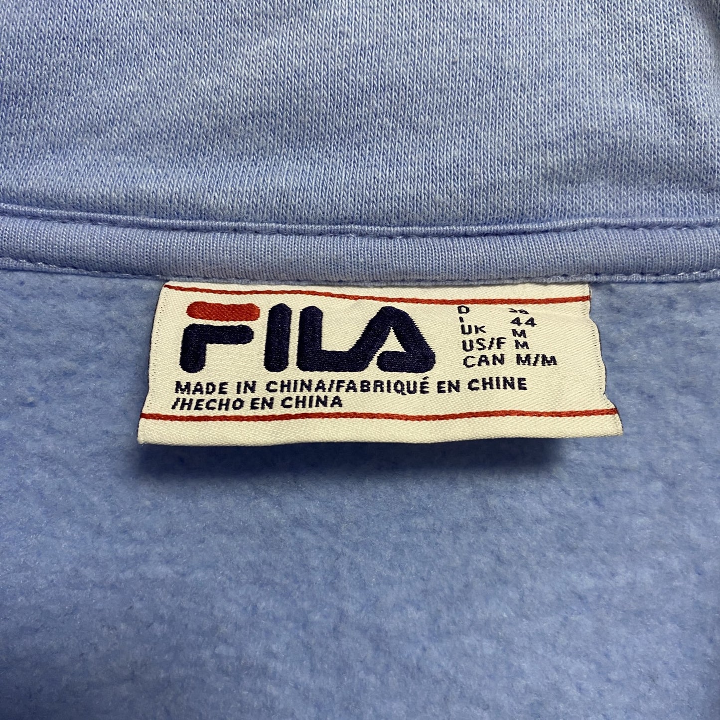 古着 used　FILA　フィラ　長袖ハーフジップ切り替えスウェット　トレーナー　ワンポイント刺繍　水色　白　黒　Mサイズ