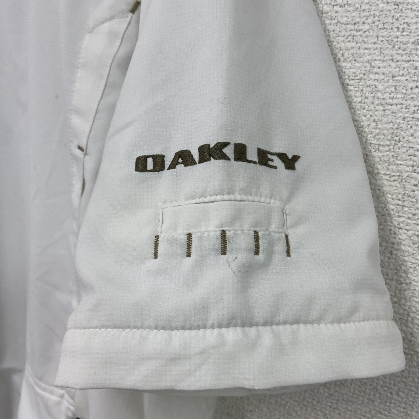 OAKLEY　オークリー　半袖プルオーバージャケット　ワンポイント　白　ホワイト　XLサイズ