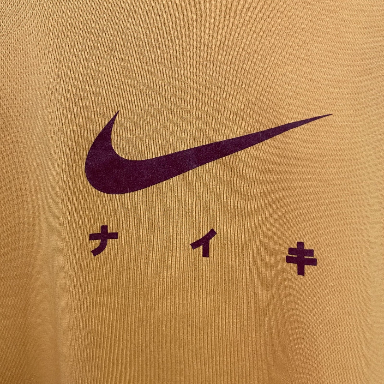 00s　NIKE　ナイキ　半袖プリントTシャツ　ヴィンテージ　スウッシュロゴ　黄　イエロー　Mサイズ