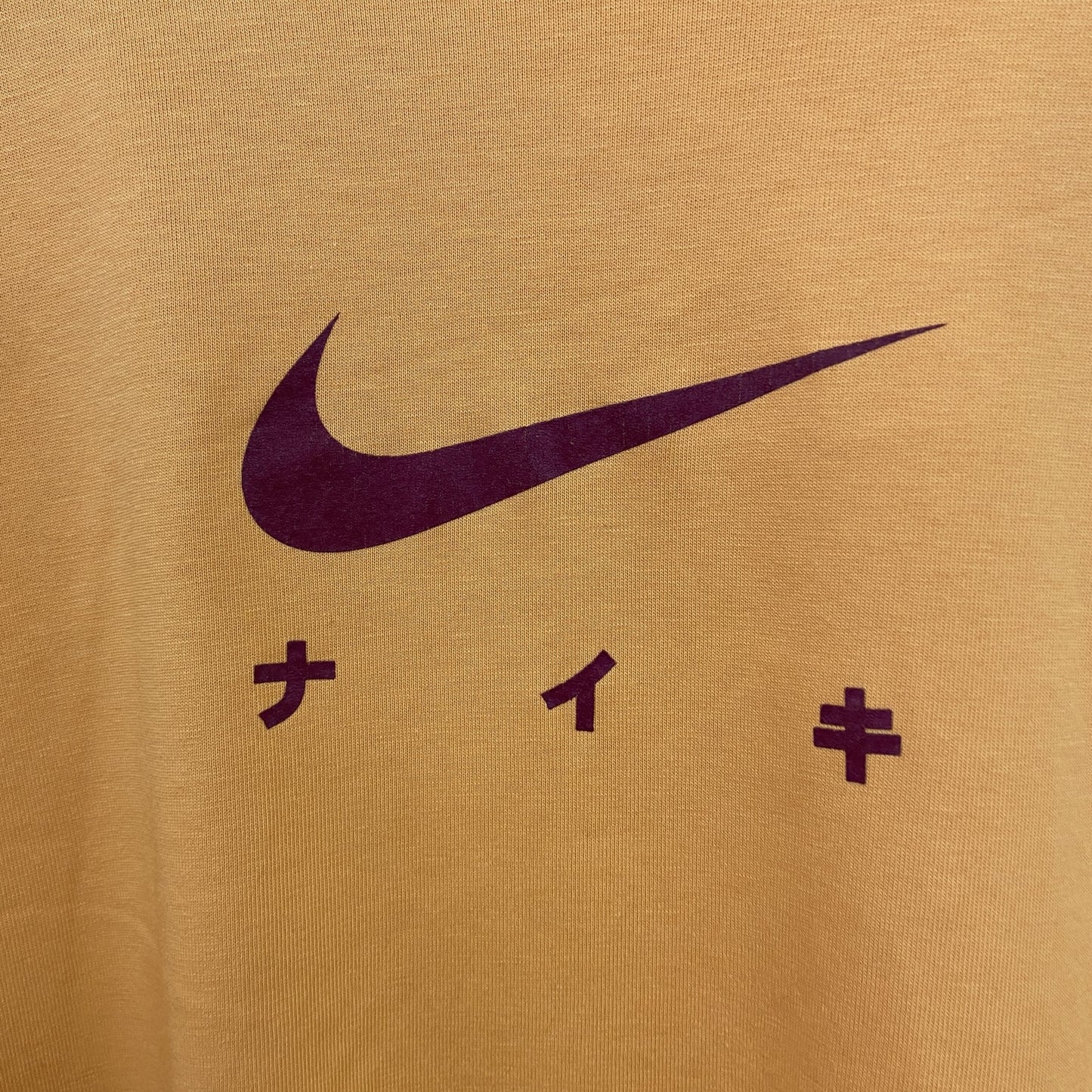 00s　NIKE　ナイキ　半袖プリントTシャツ　ヴィンテージ　スウッシュロゴ　黄　イエロー　Mサイズ