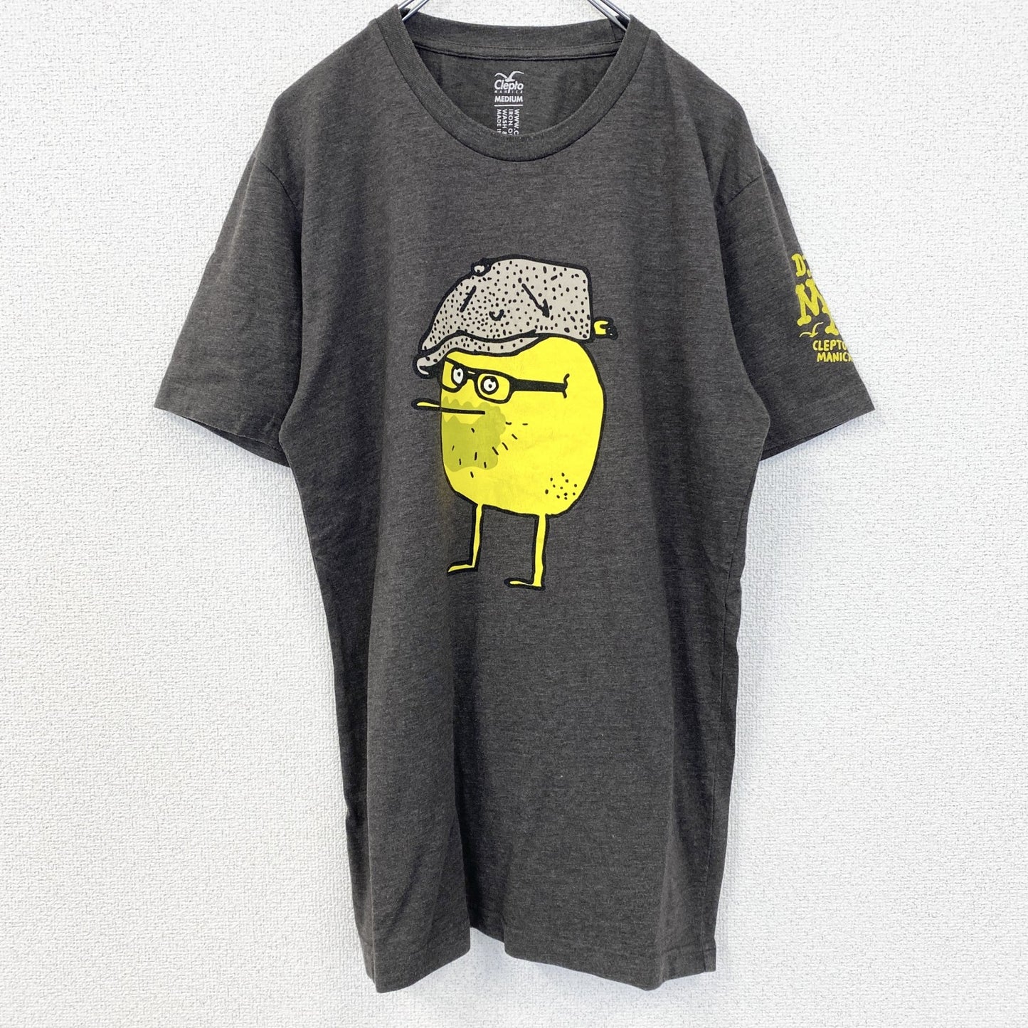 古着 used　CleptoMANICX　半袖プリントTシャツ　DJ MAD　レトロデザイン　クルーネック　カーキー　Mサイズ