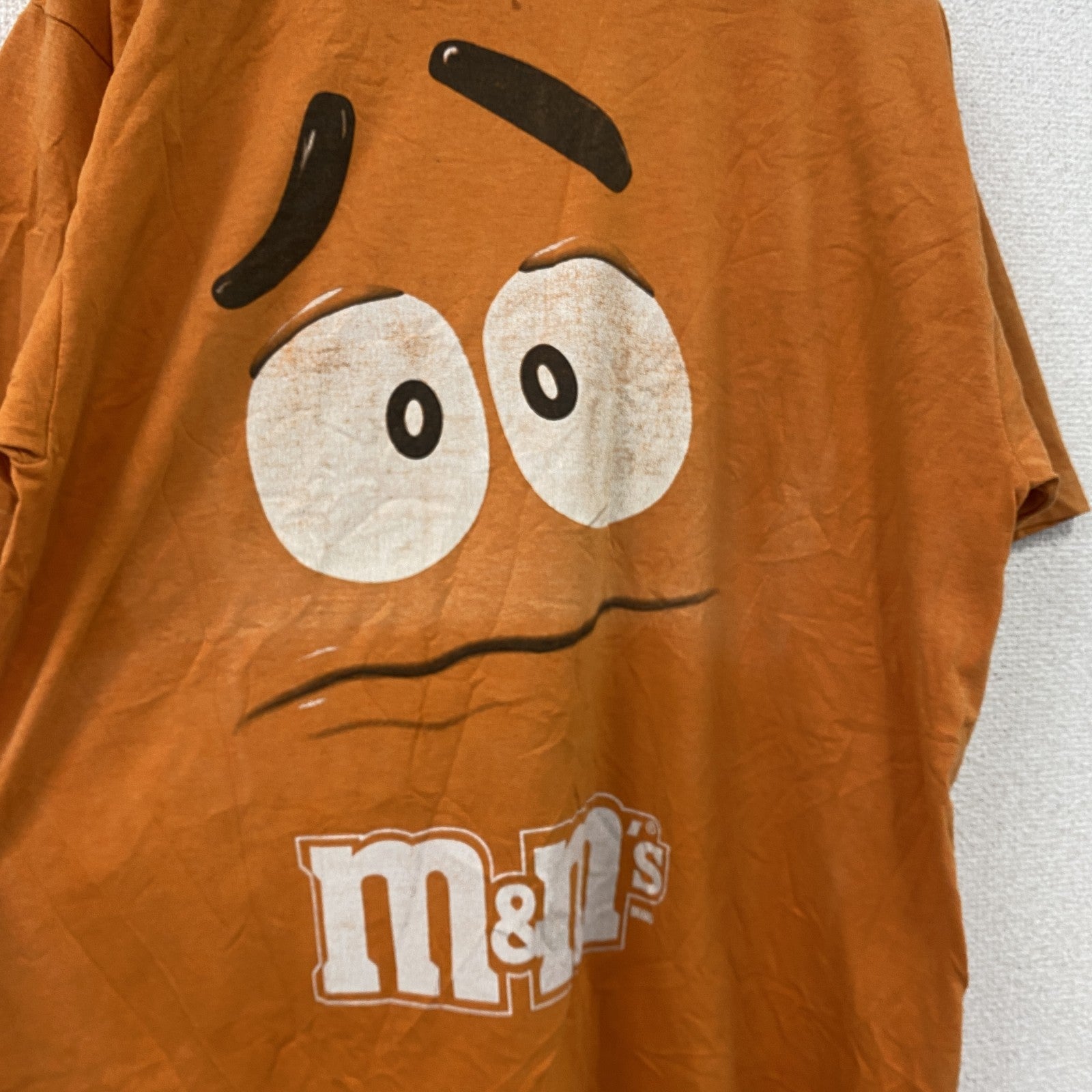 M&M's　エムアンドエムズ　半袖プリントキャラクターTシャツ　ビッグデザイン　クルーネック　橙色　オレンジ