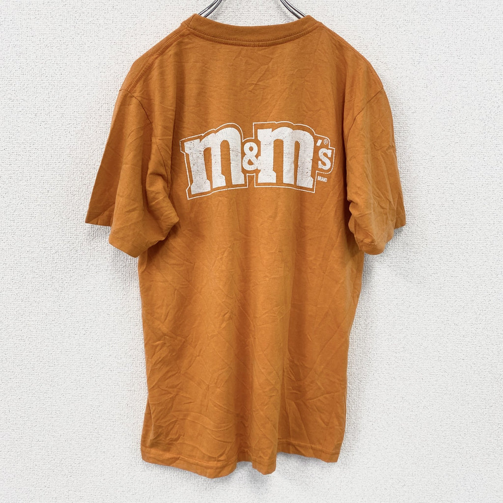 M&M's　エムアンドエムズ　半袖プリントキャラクターTシャツ　ビッグデザイン　クルーネック　橙色　オレンジ