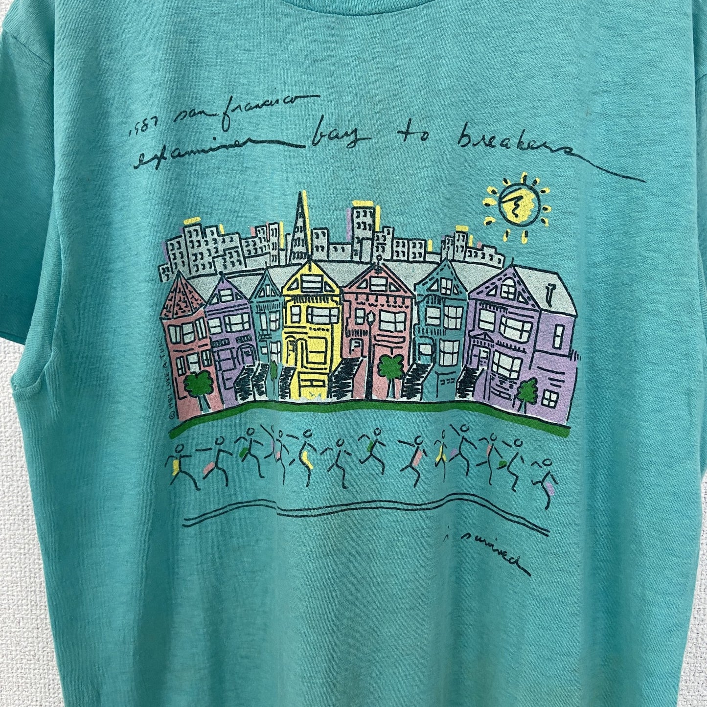 古着 used　半袖プリントTシャツ　街並み　カラフル　カジュアルデザイン　青　ブルー　シングルステッチ　90s　Lサイズ