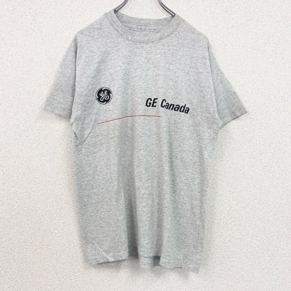 古着 used　半袖プリントTシャツ　90s　ヴィンテージ　企業ロゴ　レトロデザイン　クルーネック　シングルステッチ　灰　グレー