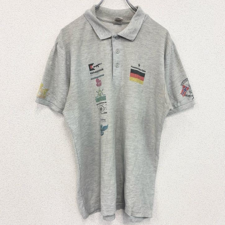 古着 used 　FRUIT OF THE LOOM　半袖プリントポロシャツ　バックプリント　レトロ　国旗　灰　グレー　Lサイズ