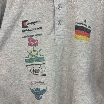古着 used 　FRUIT OF THE LOOM　半袖プリントポロシャツ　バックプリント　レトロ　国旗　灰　グレー　Lサイズ