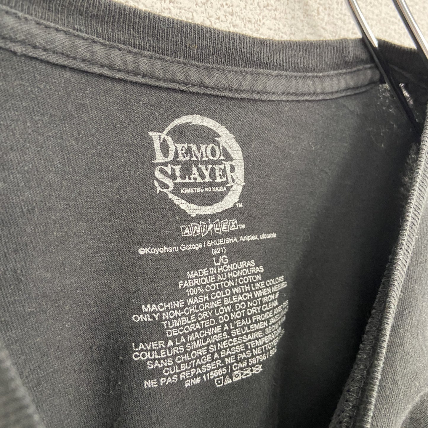 古着 used　DEMON SLAYER　半袖アニメプリントTシャツ　鬼滅の刃　黒　ブラック　クルーネック　レトロ　Lサイズ
