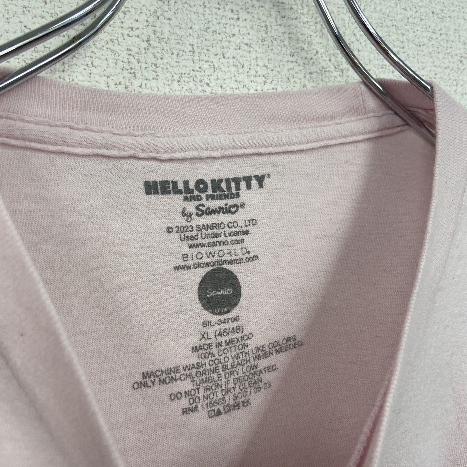 古着 used　サンリオ　ハローキティ　半袖キャラクタープリントTシャツ　レトロデザイン　クルーネック　ピンク　XLサイズ