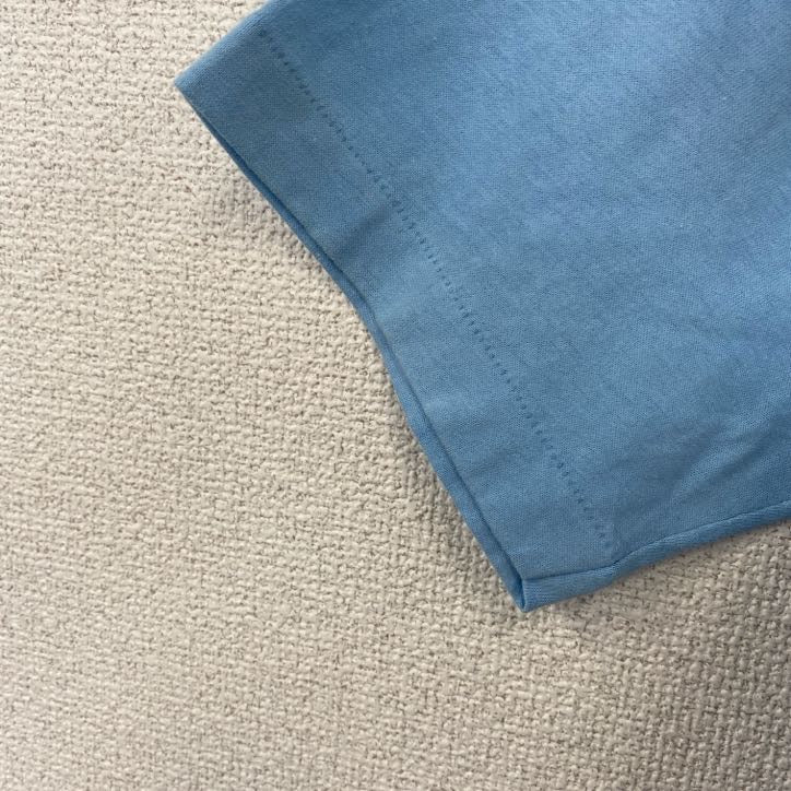 古着 used　半袖プリントTシャツ　USA製　シングルステッチ　水色　ライトブルー　クルーネック　レトロデザイン　Lサイズ