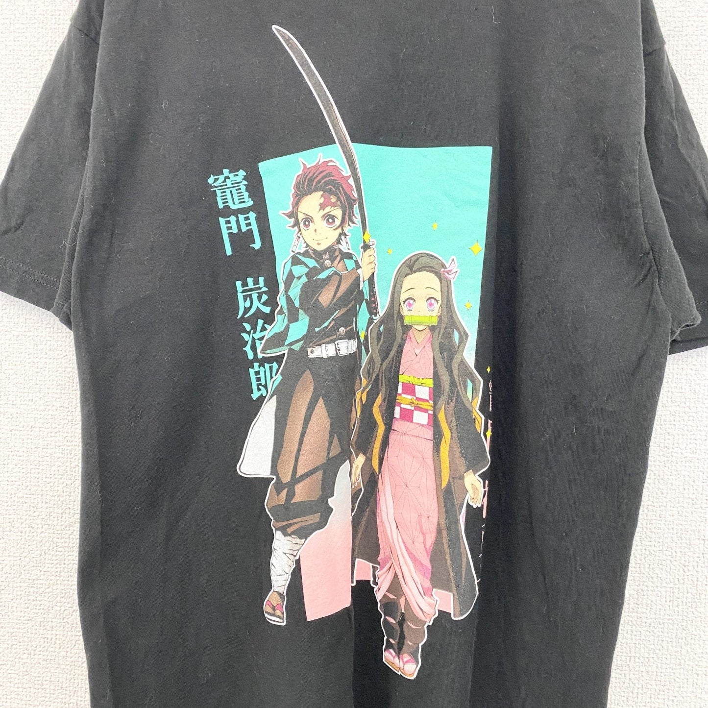 古着 used　DEMON SLAYER　半袖アニメプリントTシャツ　鬼滅の刃　クルーネック　黒　カジュアルデザイン　Mサイズ