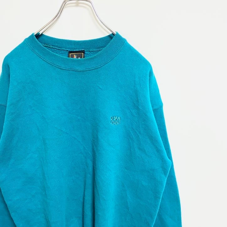 古着 used　90s　USA　オリンピック　JC PENNEY　長袖ワンポイントロゴ刺繍スウェット　青　ターコイズ　Lサイズ