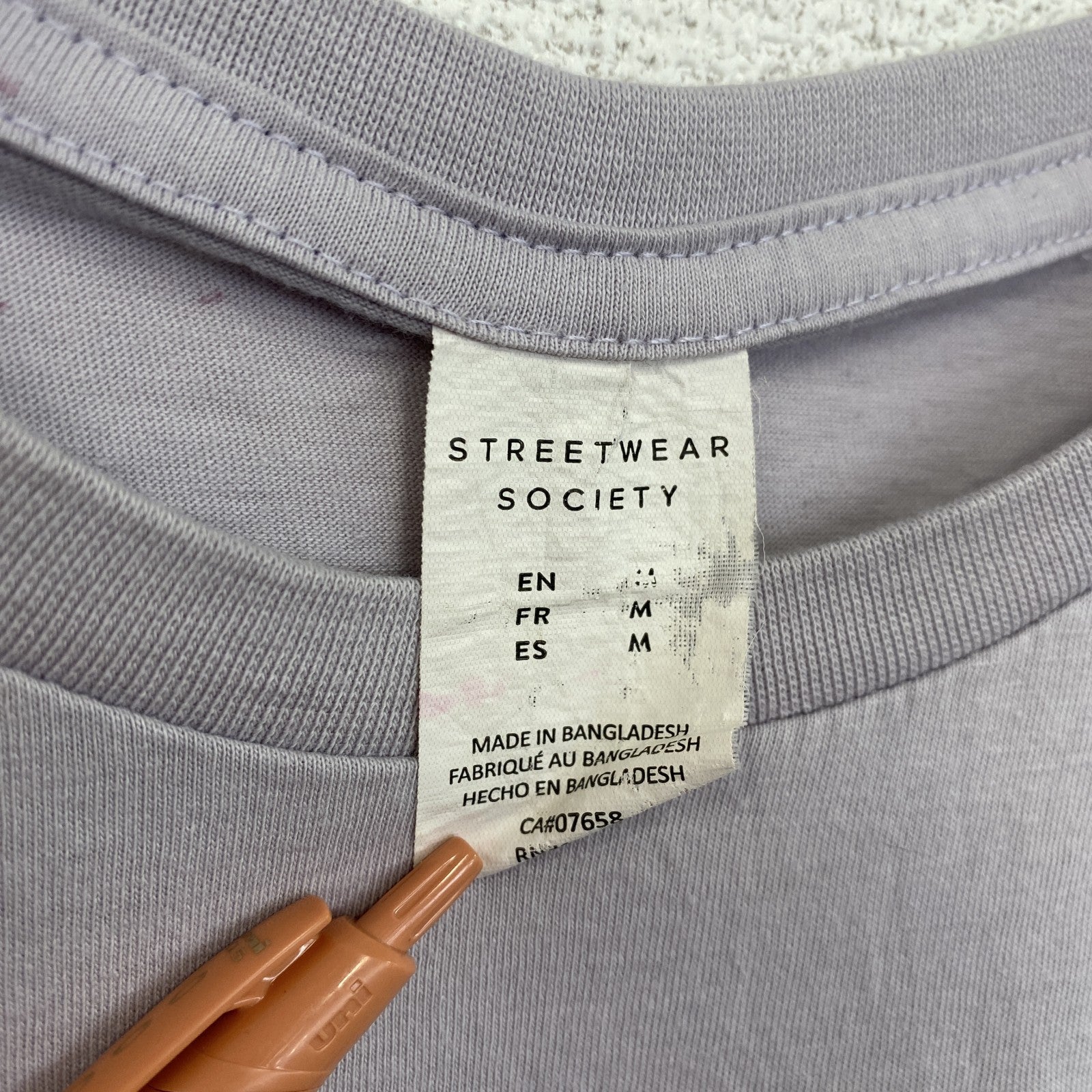 古着 used　STREETWEAR SOCIETY　半袖キャラクタープリントTシャツ　UNLIMITED　ライトピンク　Mサイズ