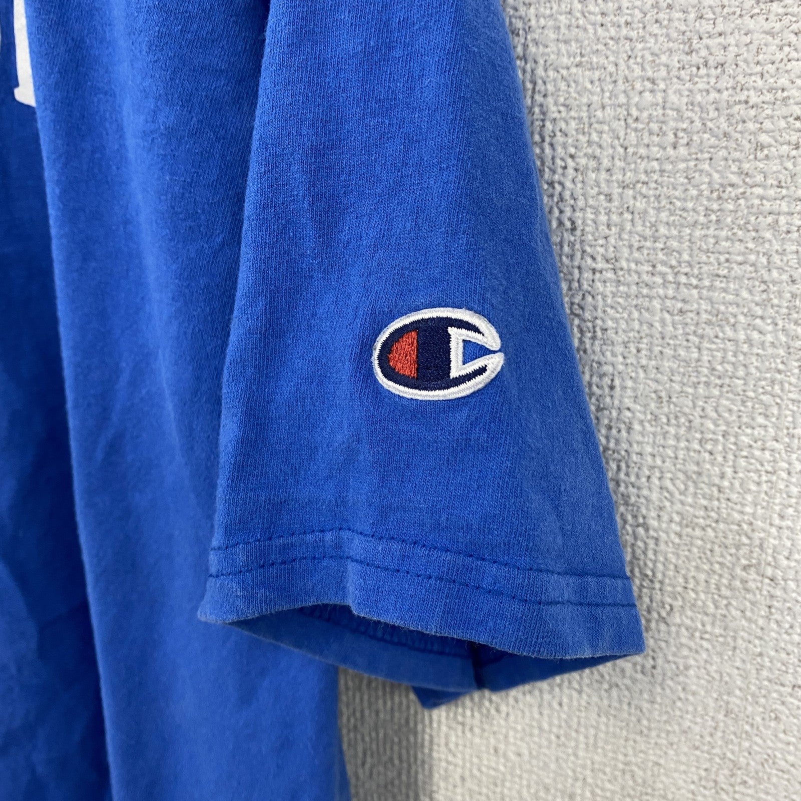 古着 used　Champion　チャンピオン　半袖アーチプリントＴシャツ　袖ロゴ　コットン　青　ブルー　Lサイズ
