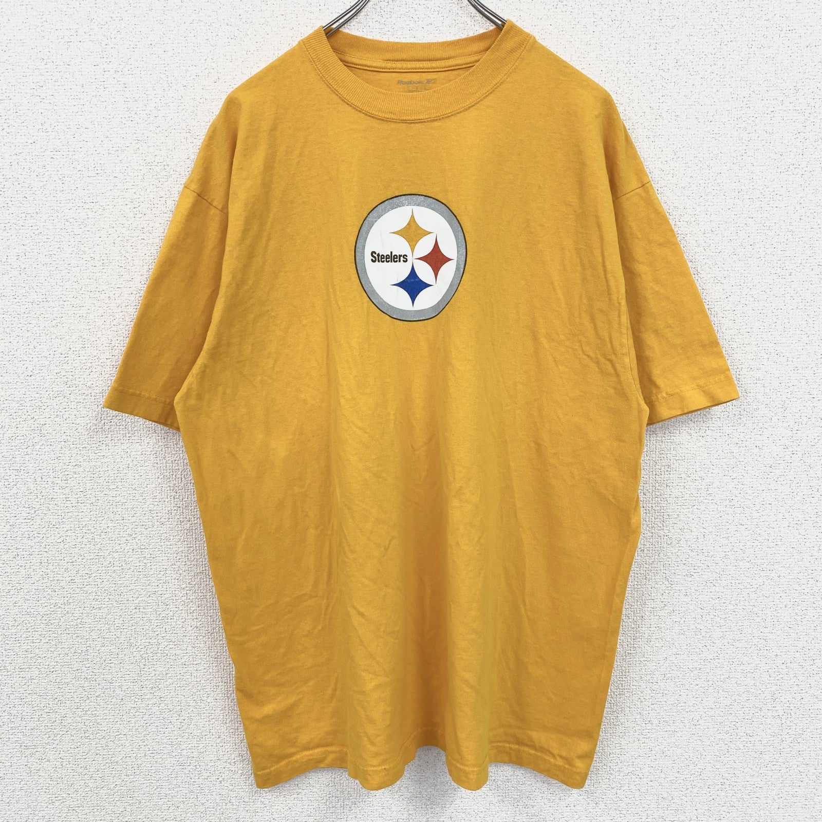 古着 used　Reebok　リーボック　NFL　半袖プリントＴシャツ　ピッツバーグスティーラーズ　フットボール　黄色　Lサイズ