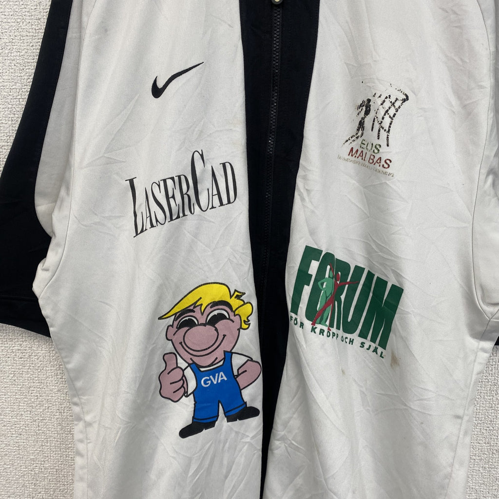 古着 used　90s　NIKE ナイキ　半袖フルジップジャージ　スウッシュロゴ　プリントデザイン　バイカラー　黒　白　Mサイズ