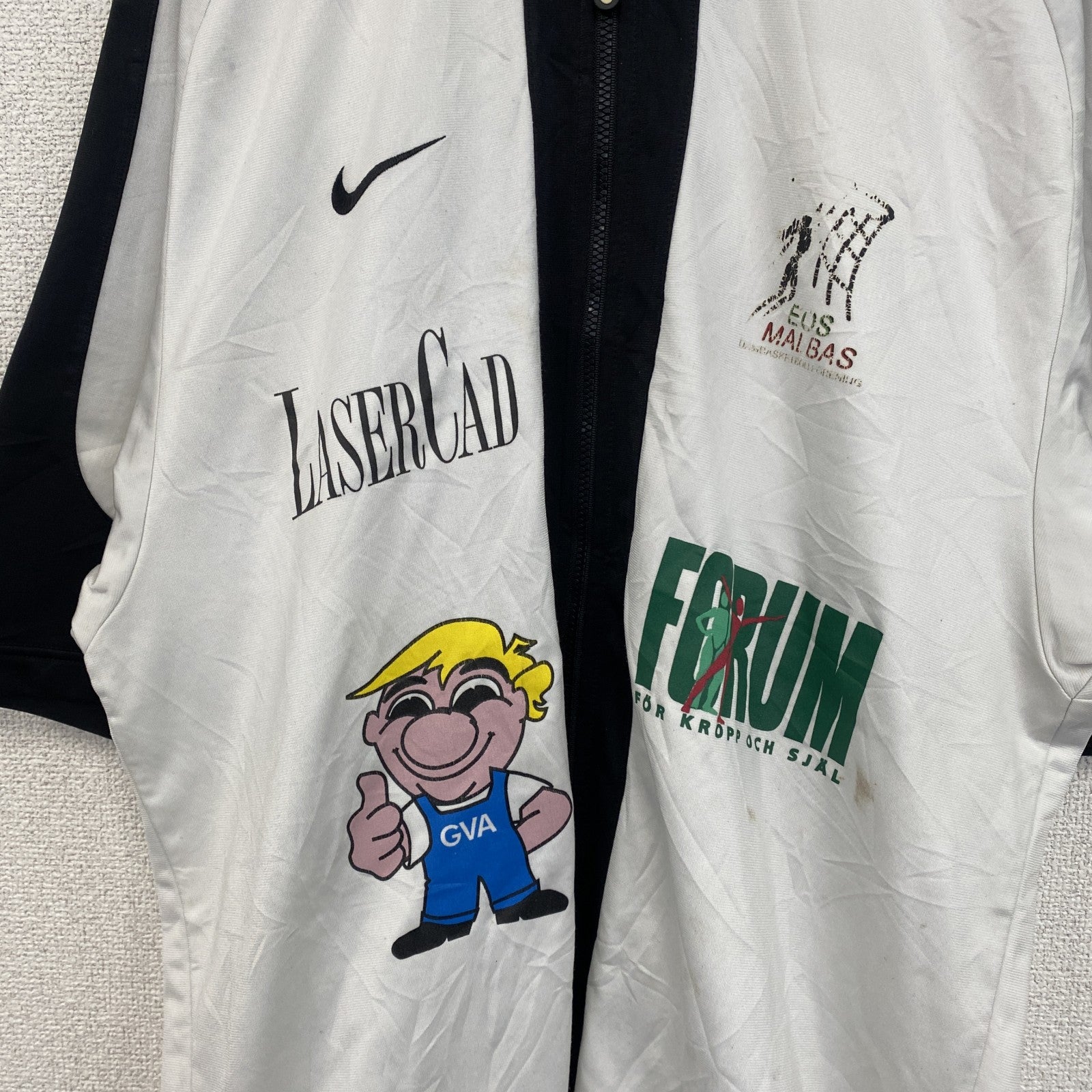 古着 used　90s　NIKE ナイキ　半袖フルジップジャージ　スウッシュロゴ　プリントデザイン　バイカラー　黒　白　Mサイズ