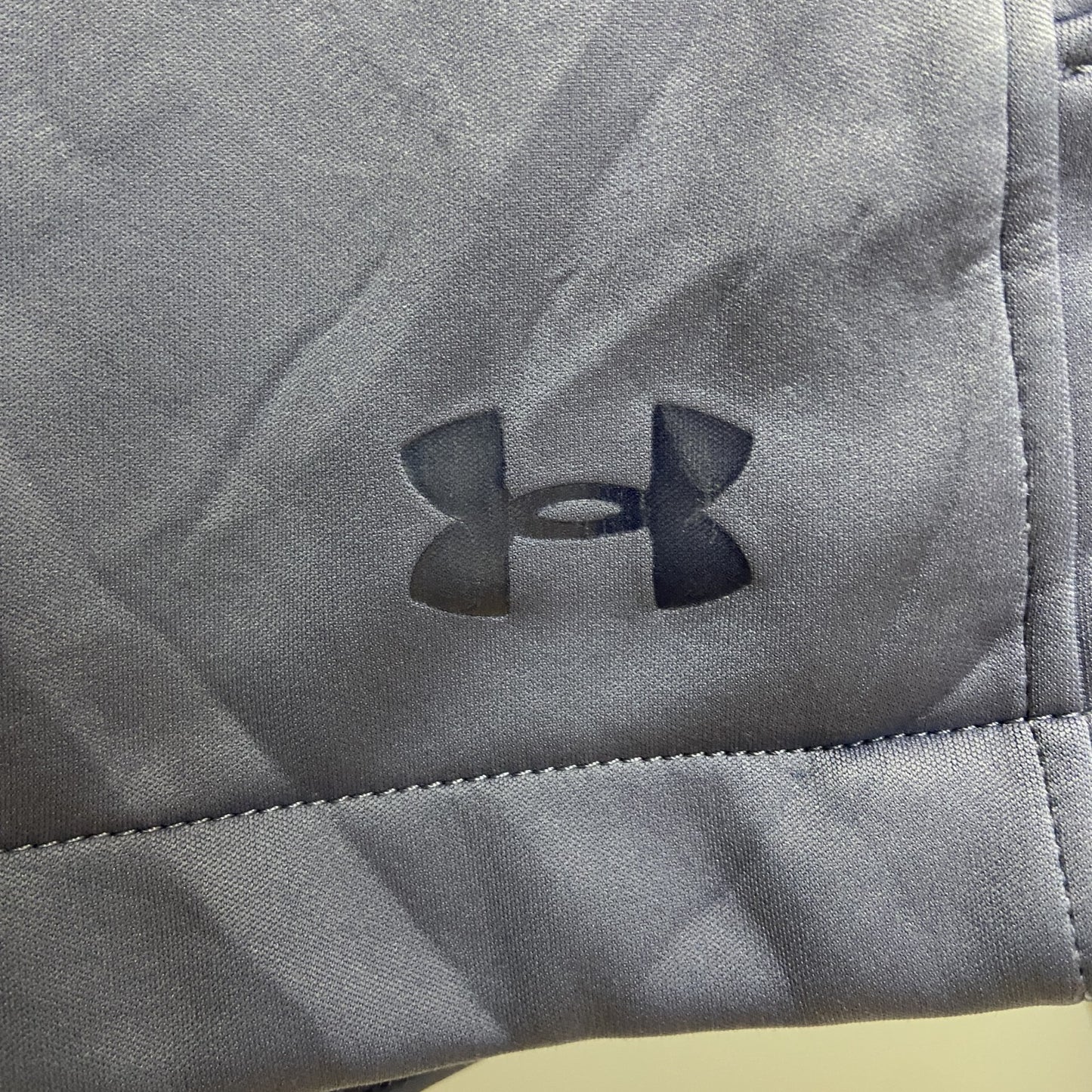 UNDER ARMOUR　アンダーアーマー　トラックジャケット/ジャージ　裏地フリース　フェード　ワンポイント　青　ブルー　Mサイズ