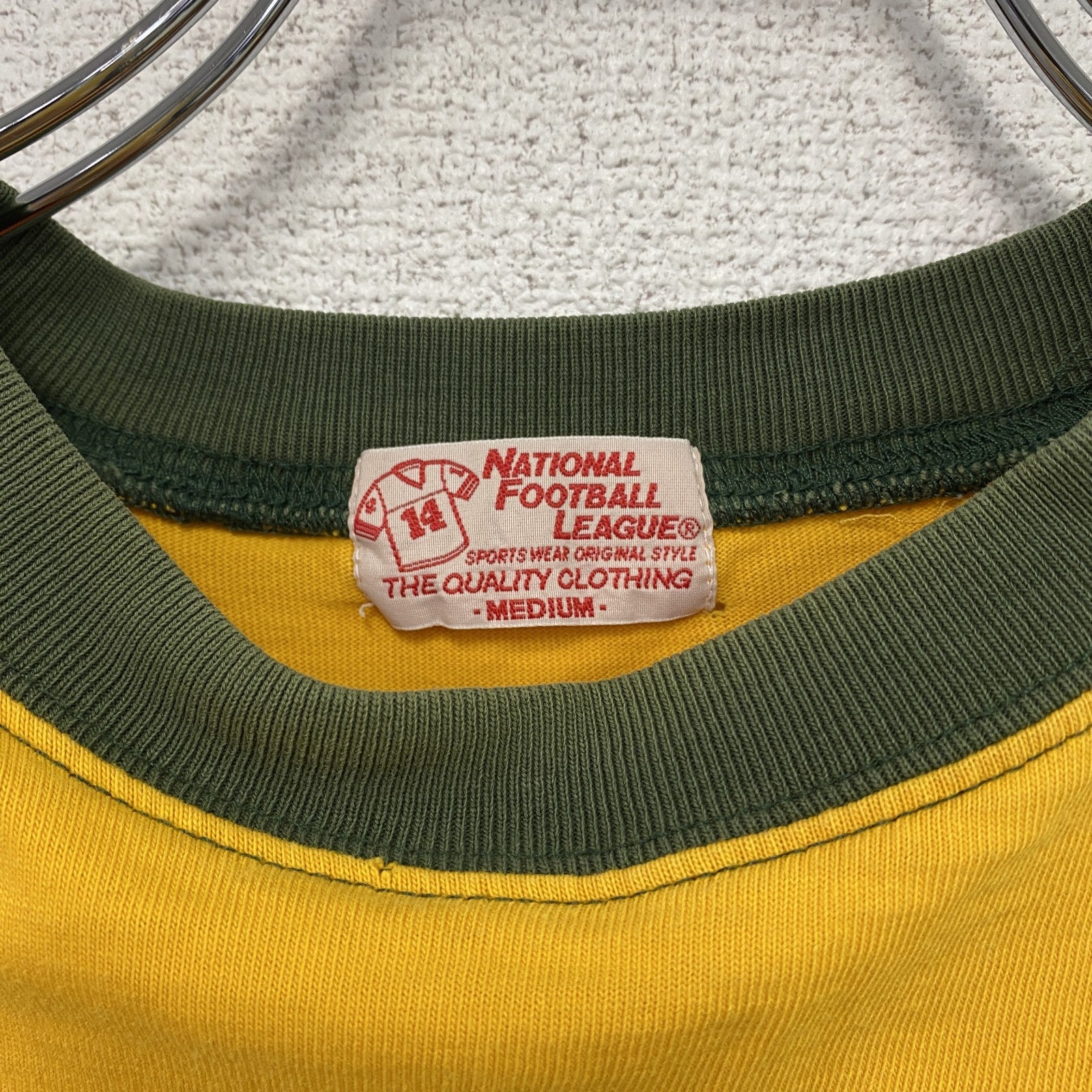 NFL　グリーンベイ・パッカーズ　半袖プリントTシャツ　ラグラン　黄色　イエロー　Mサイズ