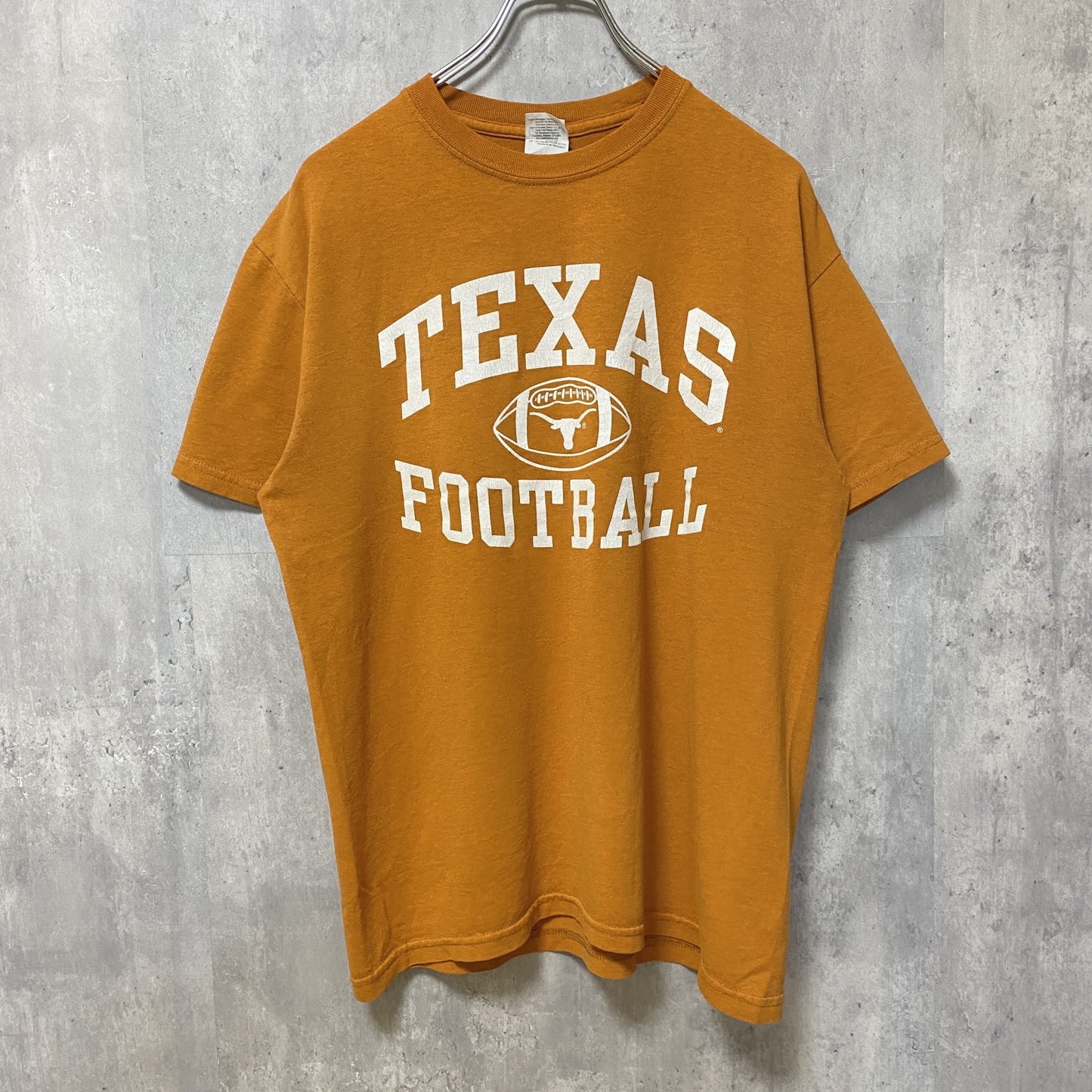 古着 used　GILDAN ギルダン　NCAA　テキサス大学　半袖プリントTシャツ　ロングホーンズ　アメフト　オレンジ　Mサイズ